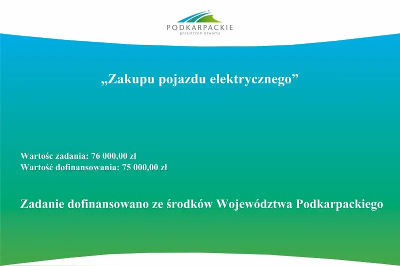 Tablica informująca o dofinansowaniu na zakup pojazdu elektrycznego